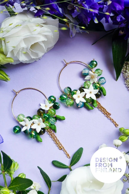 DAUGHTER OF THE NORTH ARCTIC STARFLOWER HOOP OORBELLEN 18K GOLD PLATED